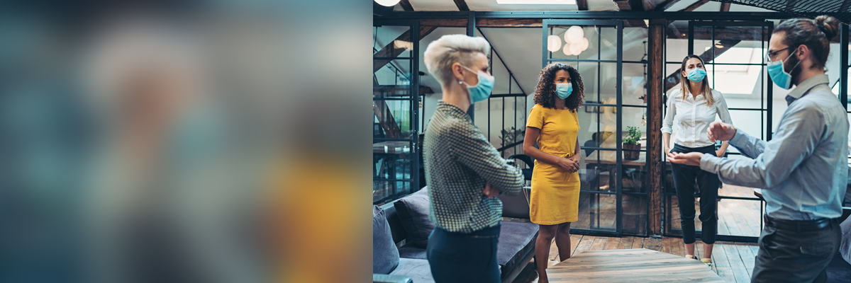 Workers wearing face coverings