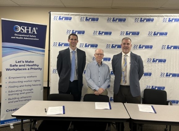 (Left to Right) •	Jake Scott- Area Director- Naperville Area Office •	Ray Woodworth- Executive Director- Three Rivers Manufacturers Association •	Jim Martineck- Area Director- Chicago South Area Office