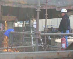 Figure 1. Fire watch observing hot work on a vessel.