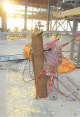 Cylinder toppling while being moved with a hand truck