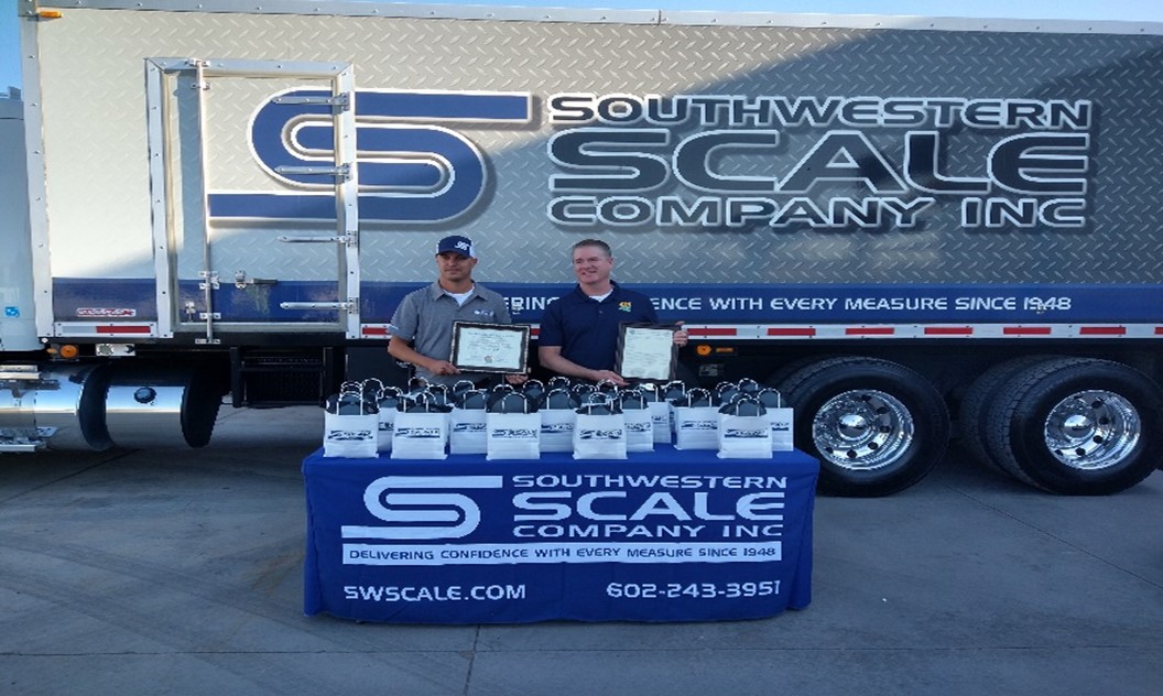 Southwestern Scale Company employees holding SHARP certificate.