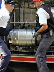 Fig. 1: Two employees lifting the keg are safer than one.