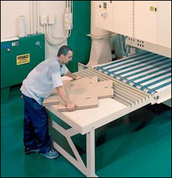 Figure 36. Reaching and bending are necessary to handle large loads or when work tables are too low.