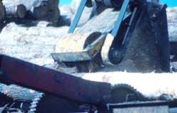 Close-up of debarker in action