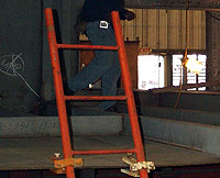 Figure 6: Portable metal ladder secured at proper 4 to 1 angle