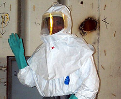 Figure 2: Worker with hand and body protection