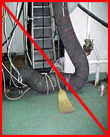 Figure 33: Improper Practice: Ventilation hose obstructing exit