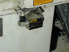 Close-up image of hydraulic safety interlock valve.