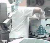 Kitchen worker using elevated reach