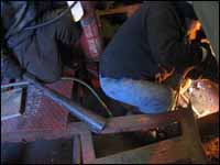 Figure 3. Fire watch with hot work (sparks) in the background.