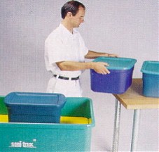 Fig. 8 Use bins with good handles and design stations to allow lifts at waist level.