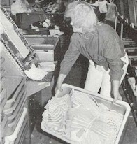 © Earl Dotter Fig. 4 Bending to lift bin.