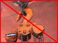 Figure 2: Improper practice - Chain fall capacity clearly marked, but with defective safety gate on hook