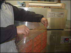 Figure 5. Transporting flexographic printing plate using a pinch grip.