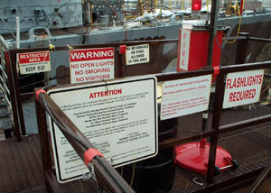 Figure 1: Warning signs posted at gangway to vessel being scrapped