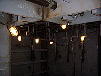 Figure 2: Temporary light bulbs protected with bulb globes and suspended out of the way