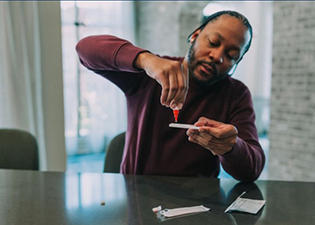 Individual taking COVID test