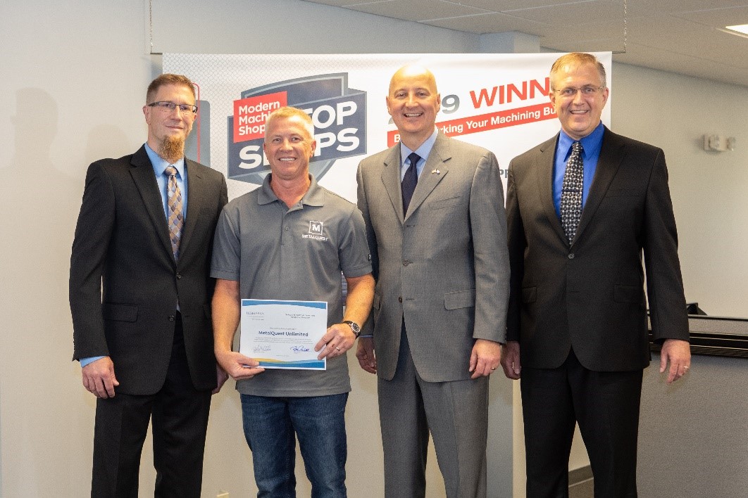 Nebraska’s governor visits the plant to congratulate MetalQuest on its induction into OSHA’s SHARP Program. L to R: MetalQuest VP and COO Scott Volk; Aaron Birrell, MetalQuest Safety Manager; Nebraska Governor Pete Ricketts; MetalQuest President Scott Harms.